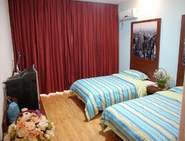 Xinlong Holiday Hotel Jiaozhou Exterior foto
